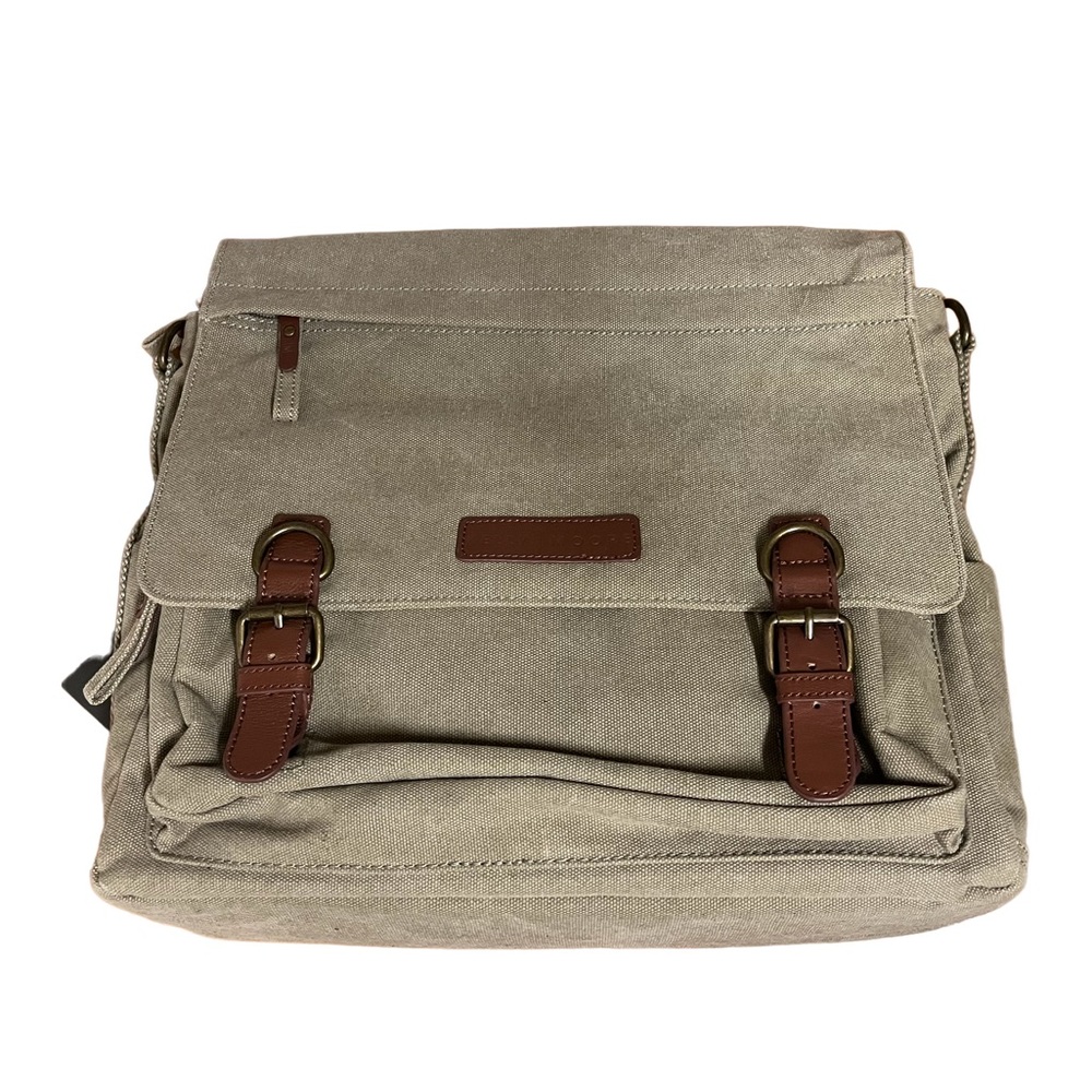 Kelly Moore bag NWT. Includes removable storage. Crossbody strap NOT included.